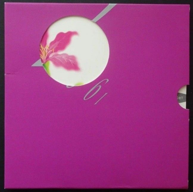 Magenta pull-out sleeve for the 1997 Hong Kong BU commemorative coin set