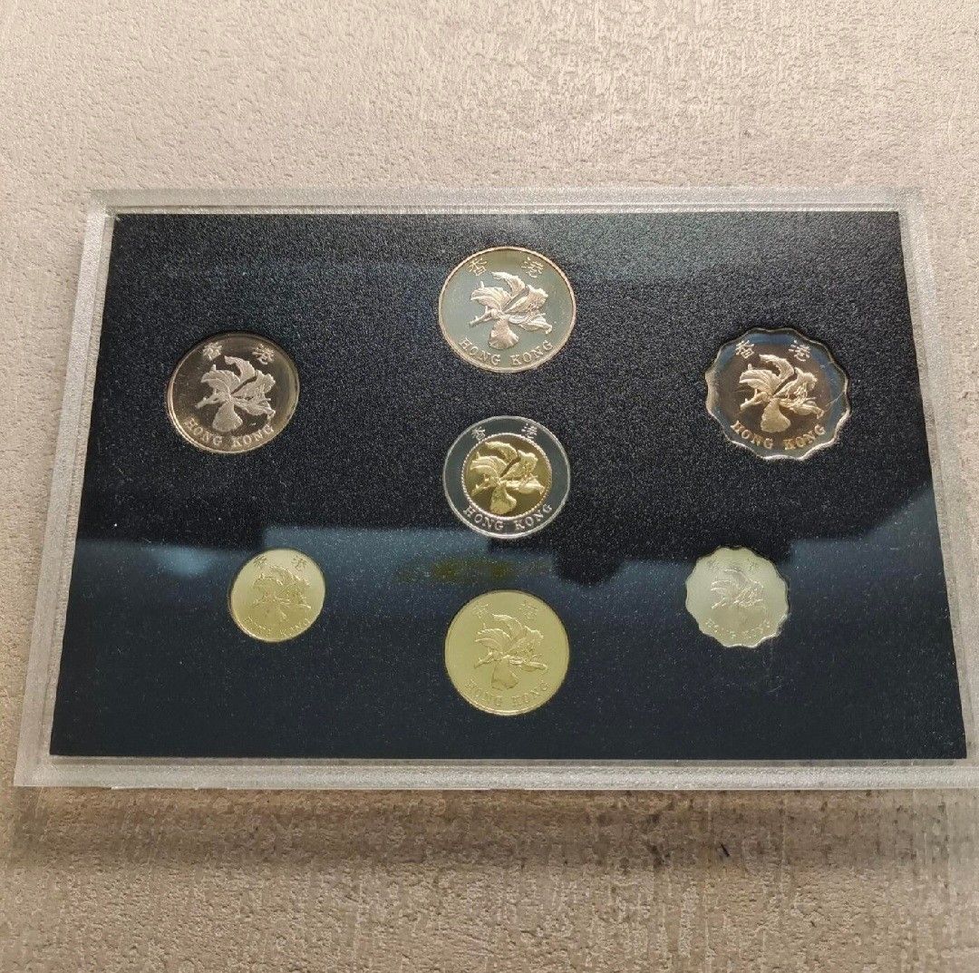 Seven 1997 Hong Kong proof coins showing the common bauhinia side