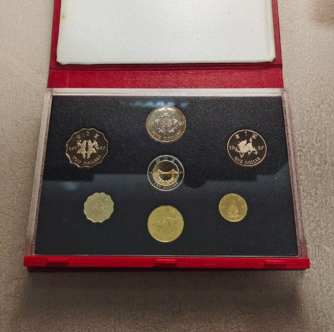 Open red case showing seven 1997 Hong Kong handover proof coins